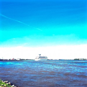 A Carnival cruise ship heading down the Big Muddy.