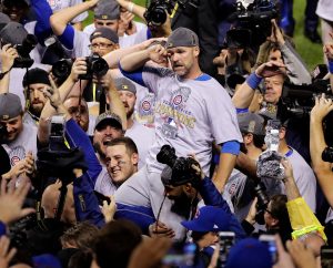 Grandpa Rossy on the shoulders of his teammates.